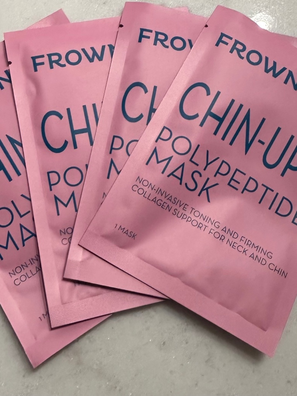 Frownies chin up polypeptide masks